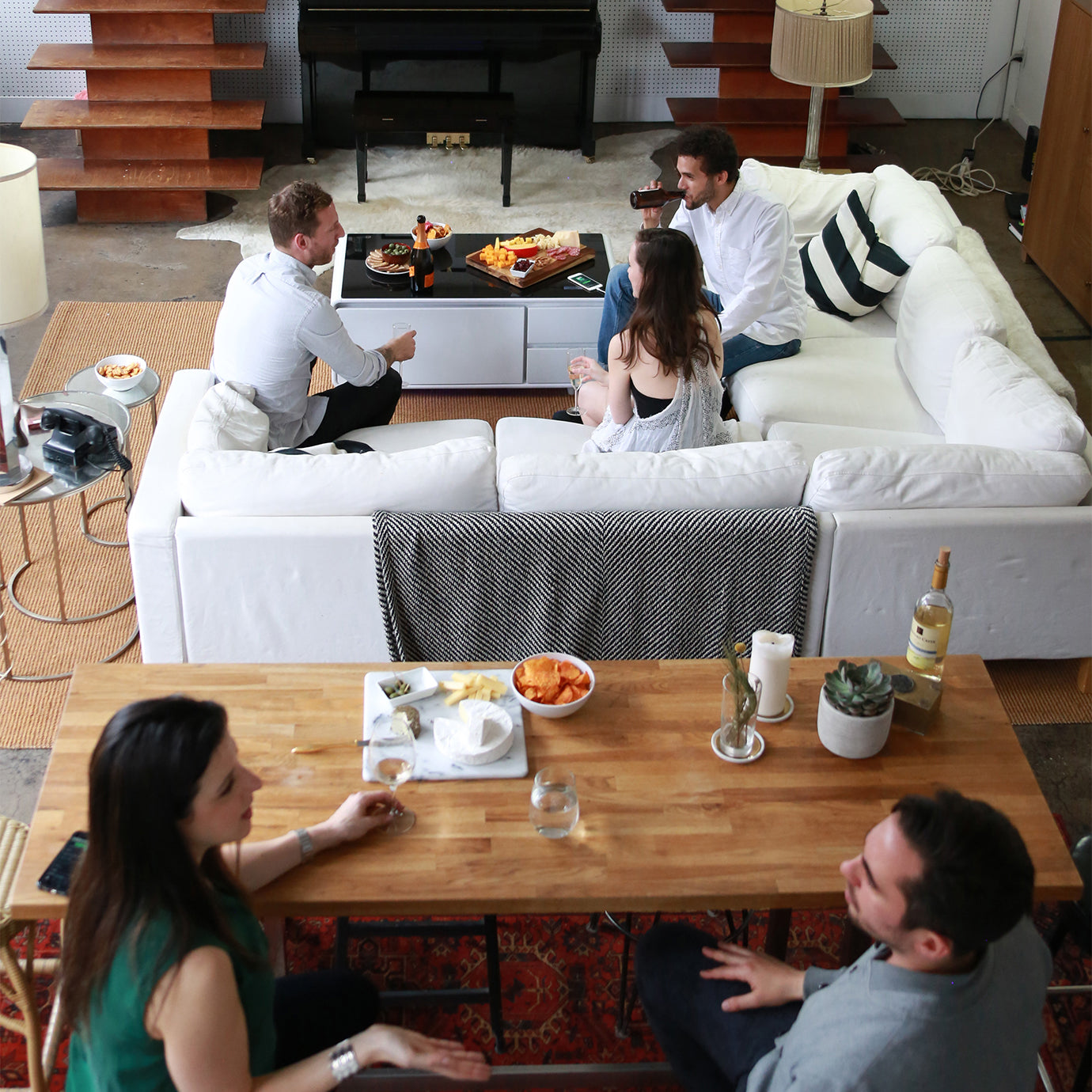 People sitting around a white Sobro table 